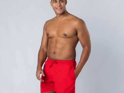 Swim shorts featuring an elastic waistband with reinforced safety stitching and a matching adjustable drawstring, complete with secure aglets - Merlin Personalised